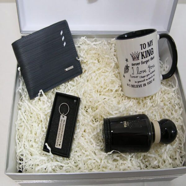 Grey gift box for men with black wallet, perfume, cup, and keychain